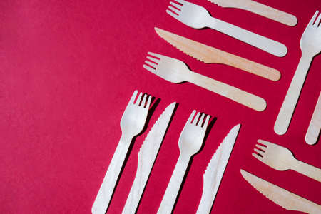 Eco friendly fast food containers. Wooden forks and knives. Eco friendly disposable tableware. Used in fast food, restaurants, takeaways, picnics. No plastic zero wasteの写真素材