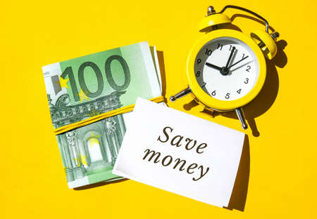 Paper note written text SAVINGS. Save money. Save today for tomorrow Euro banknotes. Money, Business, finance, investment, saving. Cash bill. Business budget of wealth and prosperity financeの写真素材