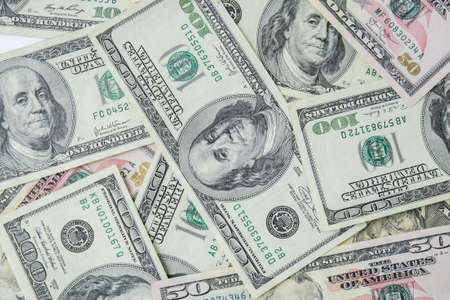 Us dollar bills are creative layout. Business concept, development perspective. Flat lay. Top view. Minimal creative style patternの写真素材