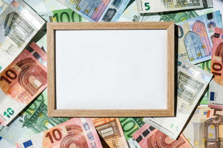 Frame with copy space around Euro banknotes. Finance background. Business, financial success and making money concept. Business budget of wealth and prosperity finance. Euros cash billの写真素材