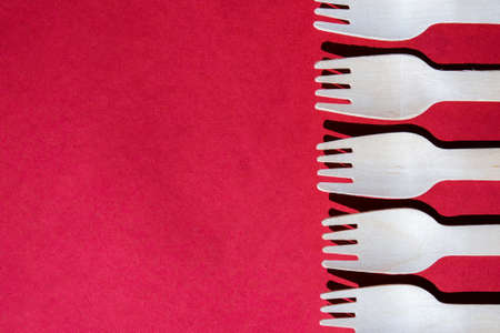 Eco friendly fast food containers. Wooden forks. Eco friendly disposable tableware. Used in fast food, restaurants, takeaways, picnics. No plastic zero wasteの写真素材