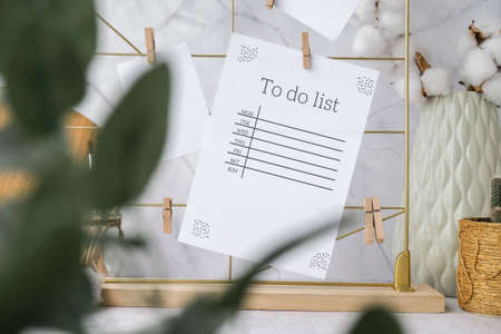 TO DO list Cards and posters mock ups on grid board. Copy space. Home office desktop. Freelance bloggers workplace. Brushes and palette tools Creativeの写真素材