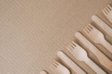 Eco friendly fast food containers. Wooden forks and knives. Eco friendly disposable tableware. Used in fast food, restaurants, takeaways, picnics. No plastic zero wasteの写真素材