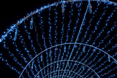 Colorful Christmas abstract bokeh background. Illumination light backdrop. Festive street night lights. Sparkle bokeh backdropの写真素材