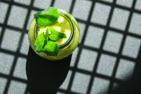 Seasonal Matcha green vegan smoothie with chia seeds and mint drink detox Breakfast. Clean eating,...