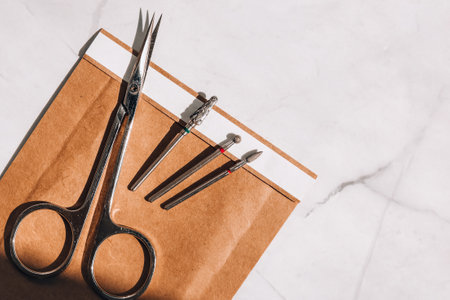 Clean manicure instruments. Manicure set in paper heat dry bag for sterilization. Sterilization of...