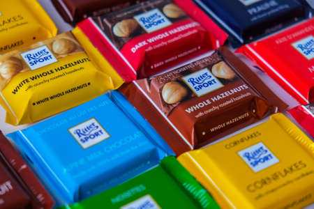 Kiev Ukraine - October 2021 chocolate Ritter Sport mini bars. German chocolate, different tastes. Little particles Square chocolate Bar made by Alfred Ritter GmbH Co. Sweet sugar foodのeditorial素材