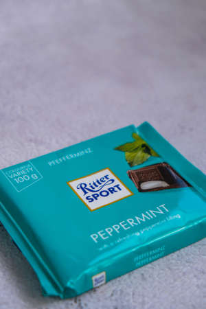Kiev Ukraine - October 2021 PEPERMINT taste. Chocolate Ritter Sport bar German chocolate, different types tastes. Square chocolate Bar made by Alfred Ritter GmbH Co. Sweet sugar foodのeditorial素材