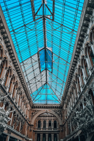 Odessa Ukraine July 2021: Architectural gallery Passage. Baroque style sculptural decorations of vintage building. Piece of art balcony in Odessa Passage. Old architecture style vintageのeditorial素材