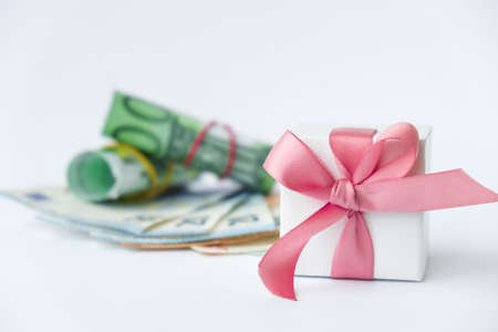 Gift present with money euro. Buying gifts for holidays. Online shopping concept. Holiday Saleの写真素材