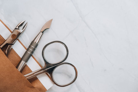 Clean manicure instruments. Manicure set in paper heat dry bag for sterilization. Sterilization of instruments healthcare concept. Copy spaceの写真素材
