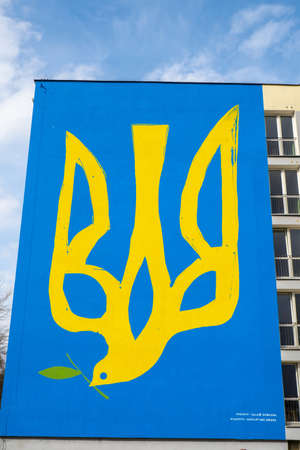 Gdansk Poland March 2022 UKRAINE national emblem with pigeon symbol of peace IN GRAFFITI. Mural...