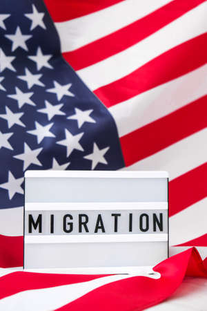 american flag. Lightbox with text MIGRATION Flag of the united states of America. July 4th Independence Day. USA patriotism national holiday. Usa proud. freedom conceptの写真素材