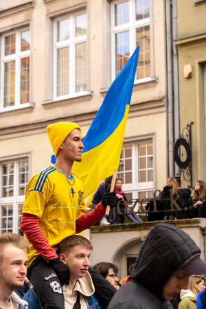 Gdansk Poland March 2022 Protest manifestation against war. Anti-war demonstration Ukrainian flag in Gdansk Poland Europe. Support and stand with Ukraine. Poland is in solidarity with Ukraineのeditorial素材