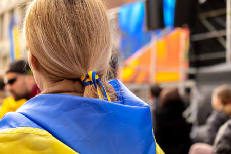 Gdansk Poland March 2022 Protest manifestation against war. Anti-war demonstration Ukrainian flag in...