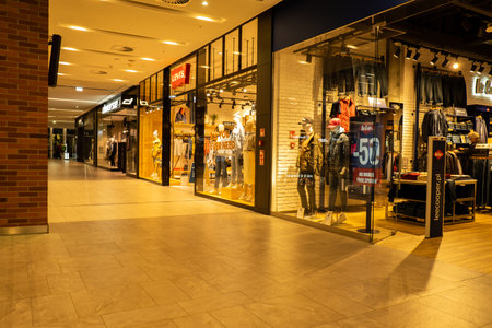 Gdansk Poland - April 2022. Forum gallery shopping mall view of the interior of the building at night. Modern shopping and entertainment centre. Architecture in the city center of Gdanskのeditorial素材