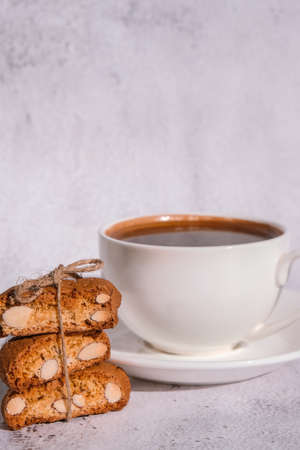 Biscotti Cantuccini Cookie Biscuits with Almonds Shortbread. White cup of coffee and traditional homemade italian cantuccini cookies. Healthy nutrition food. Gluten free bakeryの写真素材