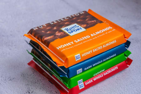 Kiev Ukraine - October 2021 Nut selection Chocolate Ritter Sport bar German chocolate, different types tastes. Square chocolate Bar made by Alfred Ritter GmbH Co. sweet sugar foodのeditorial素材