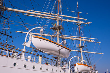 Gdynia Poland May 2022 Flag of Poland waving on flag pole of ship. Polish flag fluttering while...