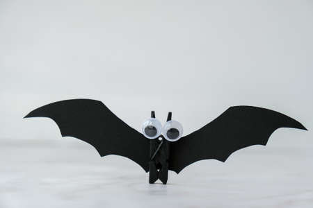 Halloween party decor handmade. DIY paper bat. Autumn fall october holiday. Trick or treat copy...