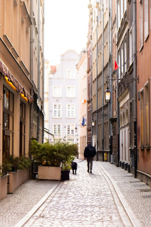 Gdansk Poland May 2022 Tourist walking in City hall at Square Traveler discover Ancient architecture of old town in Gdansk Poland. Travel destinationのeditorial素材