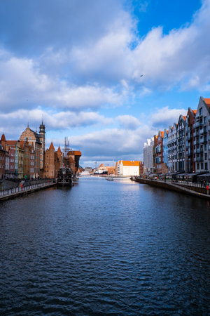Ancient crane - zuraw Old town in Gdansk. The riverside on Granary Island reflection in Moltawa River. Visit Gdansk Poland Travel destinationの写真素材
