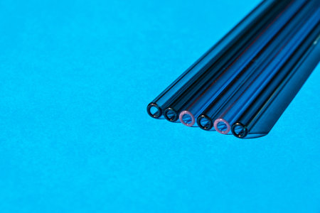 Reusable glass Straws on colorful background Eco-Friendly Drinking Straw Set with cleaning brush Reusable Comfortable Rounded tip Drinking Straw. Zero waste, plastic free concept. sustainable lifestyle. Copy space for textの写真素材