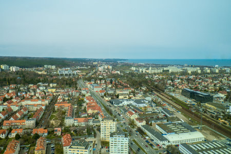 Aerial view from above Drone public transport scene in Gdansk. Oliva star business district...