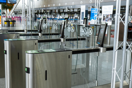 Gdansk Poland - May 2022 Passengers at Gdansk Airport terminal waiting for plane. People walking to...