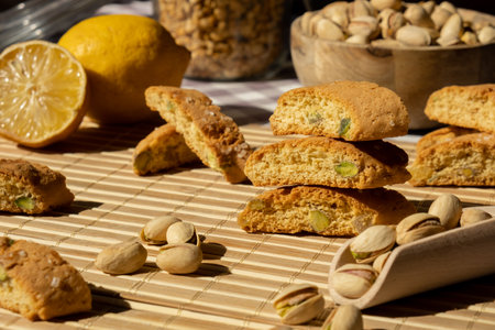 Biscotti Cantuccini Cookie Biscuits with pistachios and lemon peel Shortbread. Healthy eating food. Homemade fresh Italian cookies cantucci stacks and organic pistachios nuts. Vegan dietingの写真素材