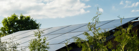 New ecologic house with solar panels Alternative to conventional energy. The battery is charged from...