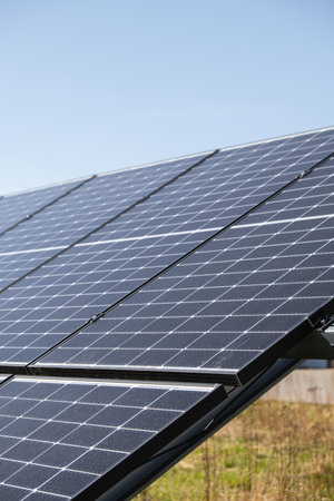 New ecologic house with solar panels Alternative to conventional energy. The battery is charged from a solar cell Advertisement Green energy Sustainable life Renewableの写真素材