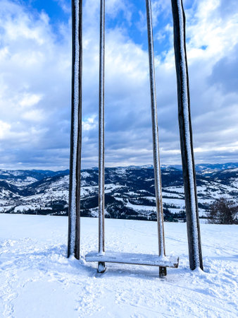 Ski swing snowy mountain winter forest with chair lift At The Ski Resort in winter. Snowy weather Ski holidays Winter sport and outdoor activities Outdoor tourismの写真素材