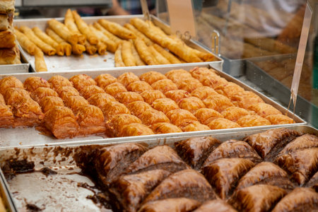 Various types or many colorful assortment of Turkish sweets for sale in street shop food festival....