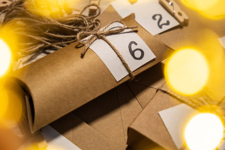 Original Advent Calendar for Christmas Homemade. Preparation to Christmas concept. Family winter holidays. Eco friendly presents gifts. open the package every dayの写真素材
