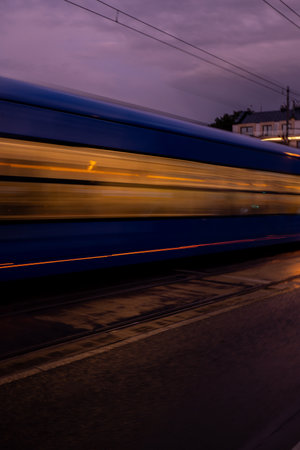 Defocused Lights of cars at night in Krakow bridge. Street line lights. Night highway city. Long...