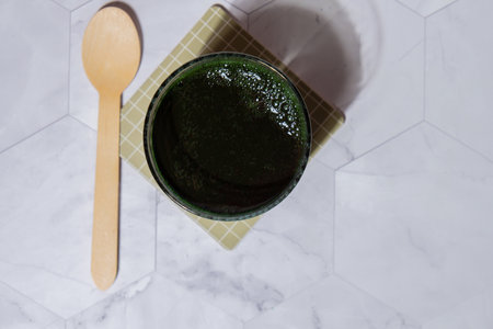Blue-green algae Chlorella and spirulina powder drink. Super powder. Natural supplement of algae. Detox superfood drink cocktail. Food supplement source of protein and beta caroteneの写真素材