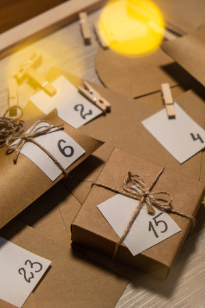 Original Advent Calendar for Christmas Homemade. Preparation to Christmas concept. Family winter...