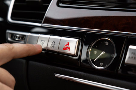 Interior of modern luxury car. Details of automatic transmission gear shift, multimedia control...