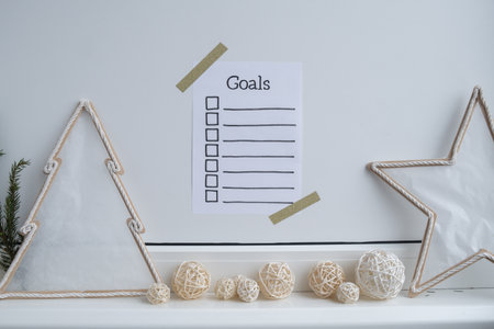 Paper note with inspirational to do checklist GOALS with natural zero waste homemade Christmas...