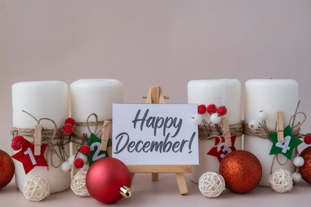 Message on paper note HAPPY DECEMBER Traditional four advent weeks calendar before Christmas...