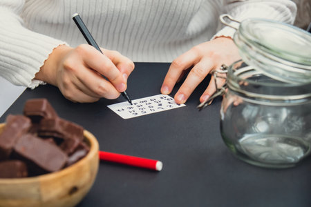 Handmade Christmas countdown advent tasty chocolate candy calendar. Festive holiday preparation craft master class of creative making decor. Hands-on activities sustainable responsible holidayの写真素材