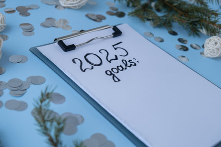 2025 GOALS Handwritten promises and aims. Preparation for new year new life new me. Visualizing wish list for 2025. Dreams plan action resolutions for coming year. Inspirational self improvementの写真素材