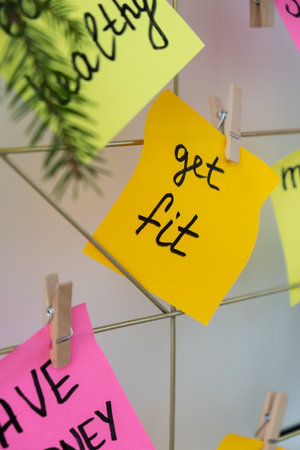 GET FIT healthy goal on Dream board promises and aims. Preparation for new year new life new me. Visualizing wish list for 2025. Dreams plan action resolutions for coming year. Inspirational self improvementの写真素材