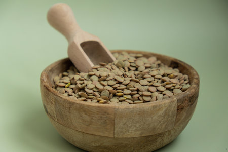 Green lentil copy space. Whole spelt grain species. High protein fiber-rich vegan plant based food ingredient. Gluten free superfood healthy nutritional dietary alternativeの写真素材