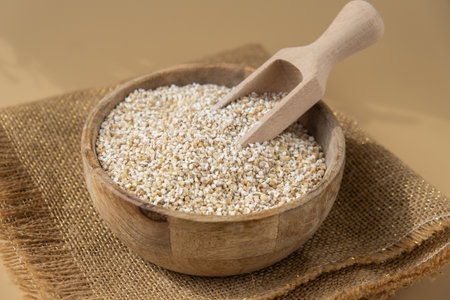 Raw fine ground barley porridge Gluten free cereals. Health gut benefits. Concept of alternative whole spelt grain ingredient. Vegetarian diet recipes. Plant-based lifestyle. Copy space Protein richの写真素材