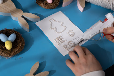 Painting Easter angel Gift Easter idea. Do it yourself instruction postcard eco-friendly decoration. Making handmade art presents childrens diy projects. Spring holiday family timeの写真素材