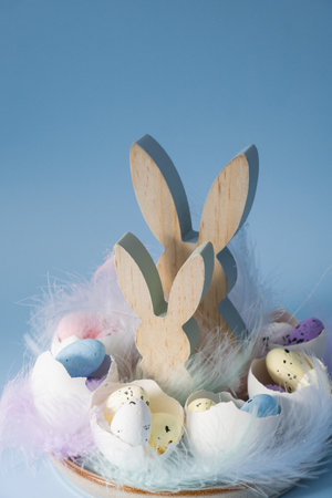 Easter holiday decoration from sustainable materials egg shell wooden bunnies eggs decor. Copy space...