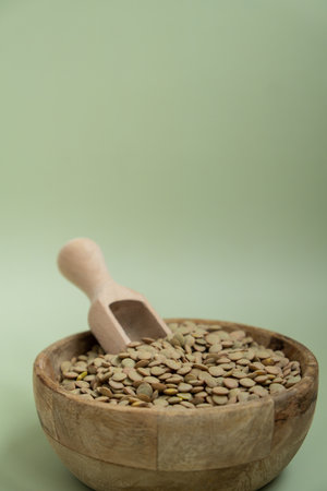 Raw green lentil Gluten free cereals. Health gut benefits. Concept of alternative whole spelt grain ingredient. Vegetarian diet recipes. Plant-based lifestyle. Copy spaceの写真素材