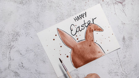 Drawing Easter rabbit bunny Storytelling of creating craft Easter greeting card holiday present. Tactile hand-on activity. Master class progress of creative me-made gifts. Seasonal domestic life micro moment hobbyの写真素材